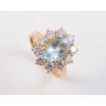 AN 18CT YELLOW GOLD, AQUAMARINE AND DIAMOND RING