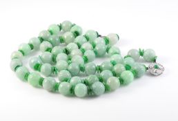 A JADEITE BEAD NECKLACE