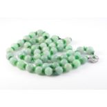 A JADEITE BEAD NECKLACE