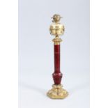A LARGE 19TH CENTURY CUT RUBY GLASS AND GILT BRASS COLUMNAR TABLE LAMP