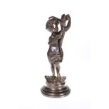 A BRONZE FIGURE OF A PUTTO IN 19th CENTURY STYLE