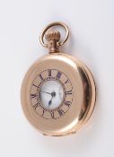 AN EARLY 20TH CENTURY GOLD PLATED HALF HUNTER POCKET WATCH