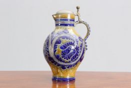 A LATE 19th CENTURY METTLACH PEWTER-MOUNTED GLAZED STONEWARE EWER