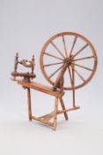 A VICTORIAN PINE SPINNING WHEEL