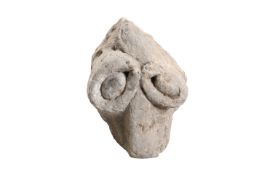 A CARVED SANDSTONE BEAR HEAD GRAVE OR TOMB MARKER