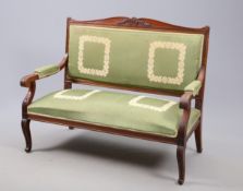 A CONTINENTAL MAHOGANY AND UPHOLSTERED CANAPE, 19TH CENTURY