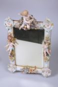 A DRESDEN PORCELAIN MIRROR