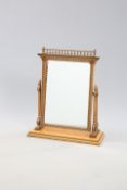 A LARGE VICTORIAN "REFORMED GOTHIC" MIRROR