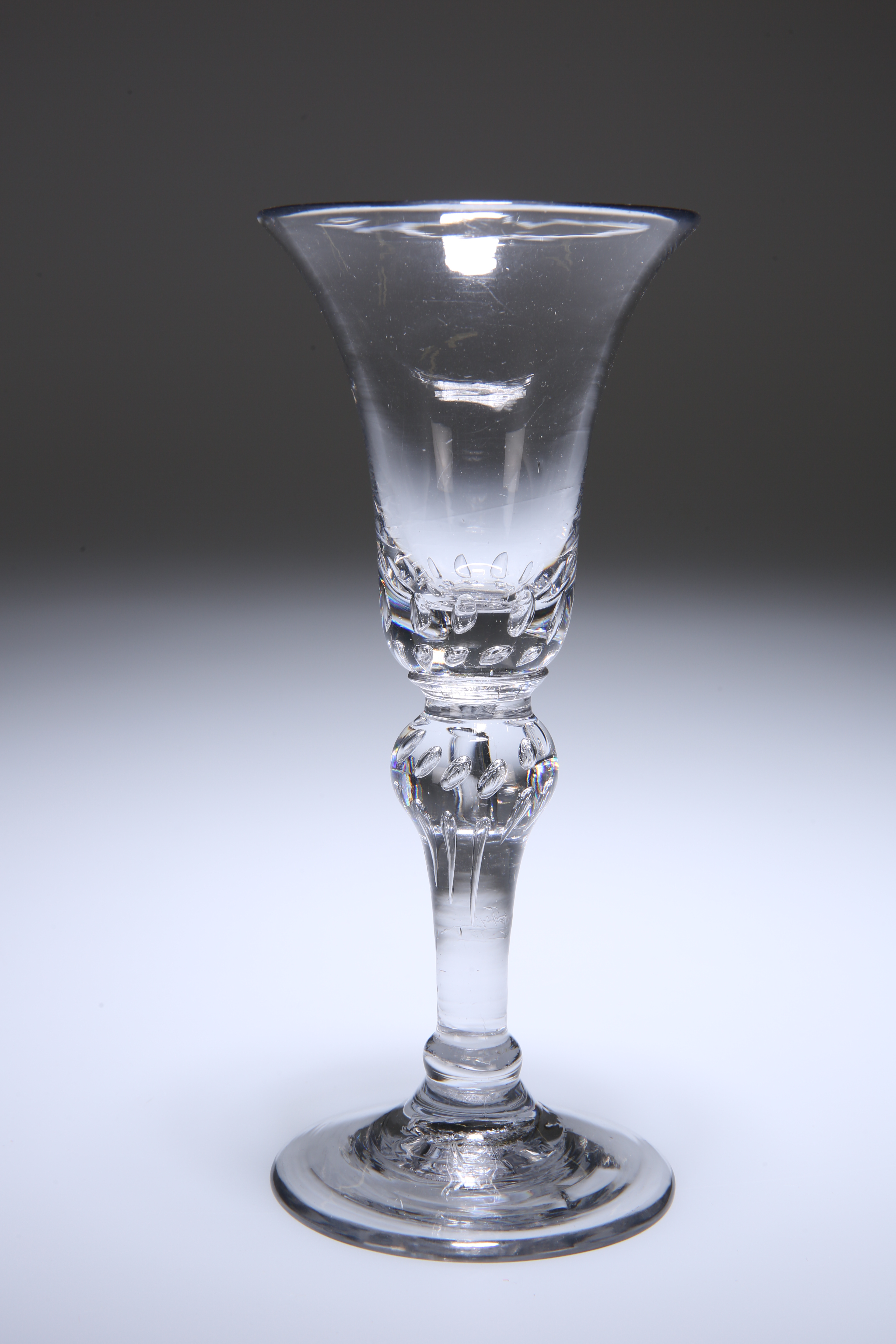 A BALUSTER WINE GLASS, c. 1740