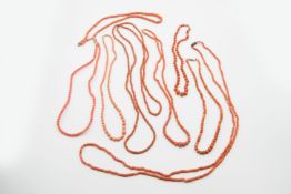 A COLLECTION OF NINE CORAL BEAD NECKLACES