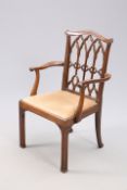 A VICTORIAN MAHOGANY OPEN ARMCHAIR IN THE GOTHIC CHIPPENDALE STYLE