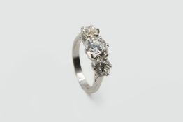 A THREE STONE DIAMOND RING