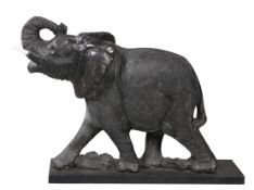 A LARGE CARVED STONE MODEL OF AN ELEPHANT, POSSIBLY INDIAN