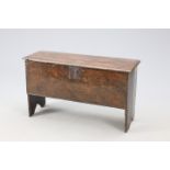 A 17TH CENTURY BOARDED OAK CHEST