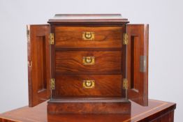 A WALNUT COLLECTOR'S CABINET
