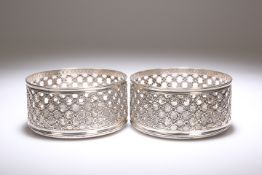 A PAIR OF VICTORIAN SILVER WINE-COASTERS, BY DANIEL AND CHARLES HOULE, LONDON, 1852