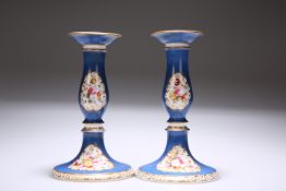 A PAIR OF ENGLISH PORCELAIN CANDLESTICKS