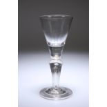 A VERY RARE BALUSTER WINE GLASS, c. 1715