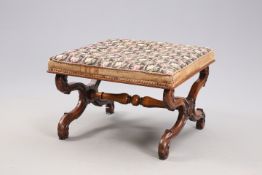 A VICTORIAN WALNUT AND UPHOLSTERED X-FORM STOOL