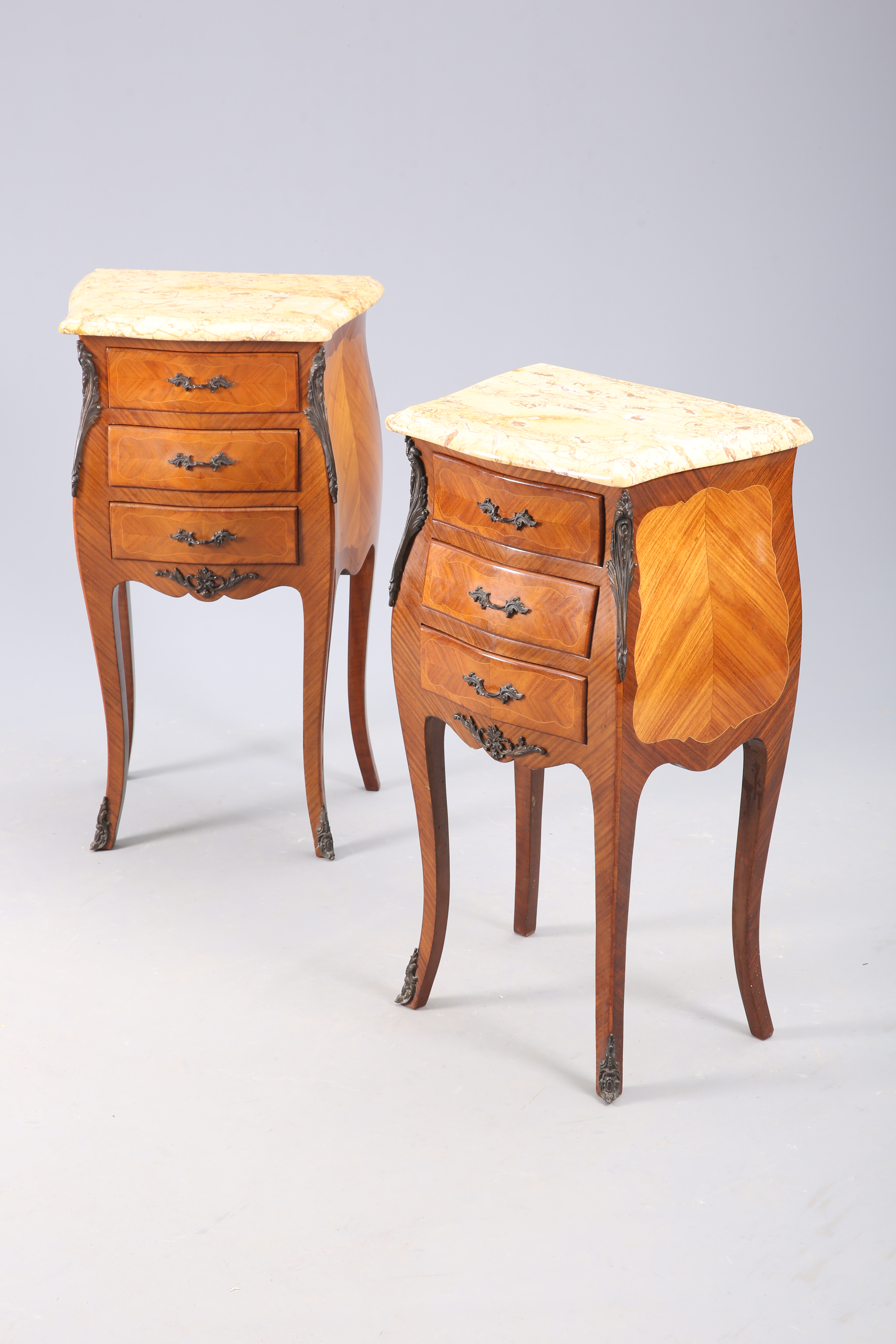 A PAIR OF MARBLE-TOPPED SIDE TABLES IN LOUIS XV STYLE