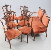 A VICTORIAN ROSEWOOD PARLOUR SUITE