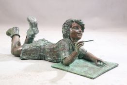 A LARGE BRONZE FIGURE OF A BOY