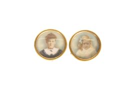 A PAIR OF EARLY 20TH CENTURY PORTRAIT MINIATURES ON IVORY