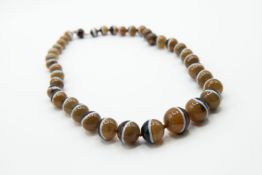 A BANDED AGATE NECKLACE