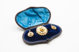 A MID VICTORIAN BROOCH AND EARRING SET
