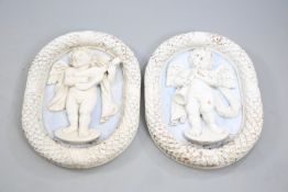 A LARGE PAIR OF CARVED AND PAINTED PANELS, 19TH CENTURY