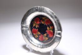 WILLIAM MOORCROFT FOR LIBERTY & CO., A TUDRIC PEWTER MOUNTED POMEGRANATE BOWL