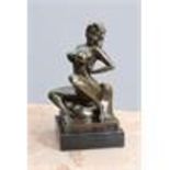 AN EROTIC BRONZE FIGURE OF A SEATED FEMALE STRIPPER 20TH CENTURY