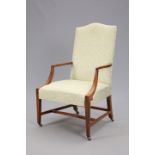 AN EARLY 19TH CENTURY MAHOGANY AND UPHOLSTERED ARMCHAIR