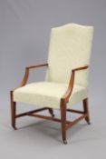 AN EARLY 19TH CENTURY MAHOGANY AND UPHOLSTERED ARMCHAIR