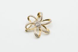 AN 18CT YELLOW GOLD AND DIAMOND BROOCH