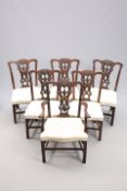 A SET OF SIX VICTORIAN CHIPPENDALE STYLE MAHOGANY DINING CHAIRS