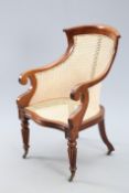 A VICTORIAN MAHOGANY AND CANEWORK BERGERE, MID 19TH CENTURY