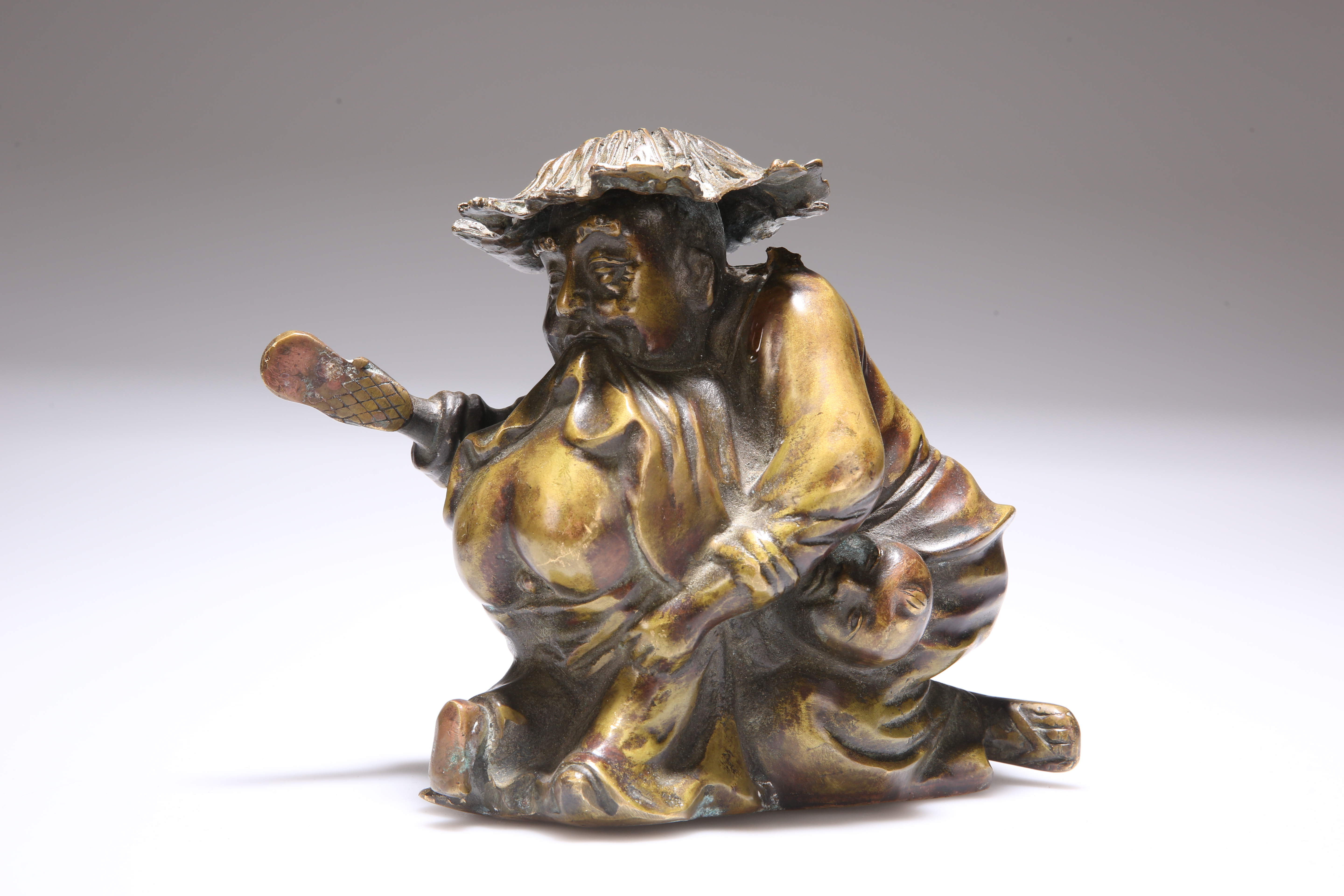 A CHINESE BRONZE FIGURE GROUP