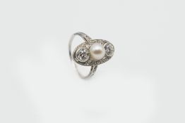 AN EDWARDIAN CULTURED PEARL AND DIAMOND RING