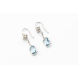 A PAIR OF AQUAMARINE AND DIAMOND EARRINGS