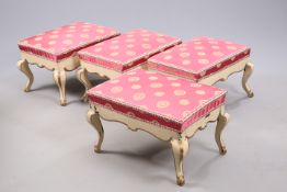 A SET OF FOUR CONTINENTAL PAINTED STOOLS