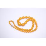 AN AMBER BEAD NECKLACE