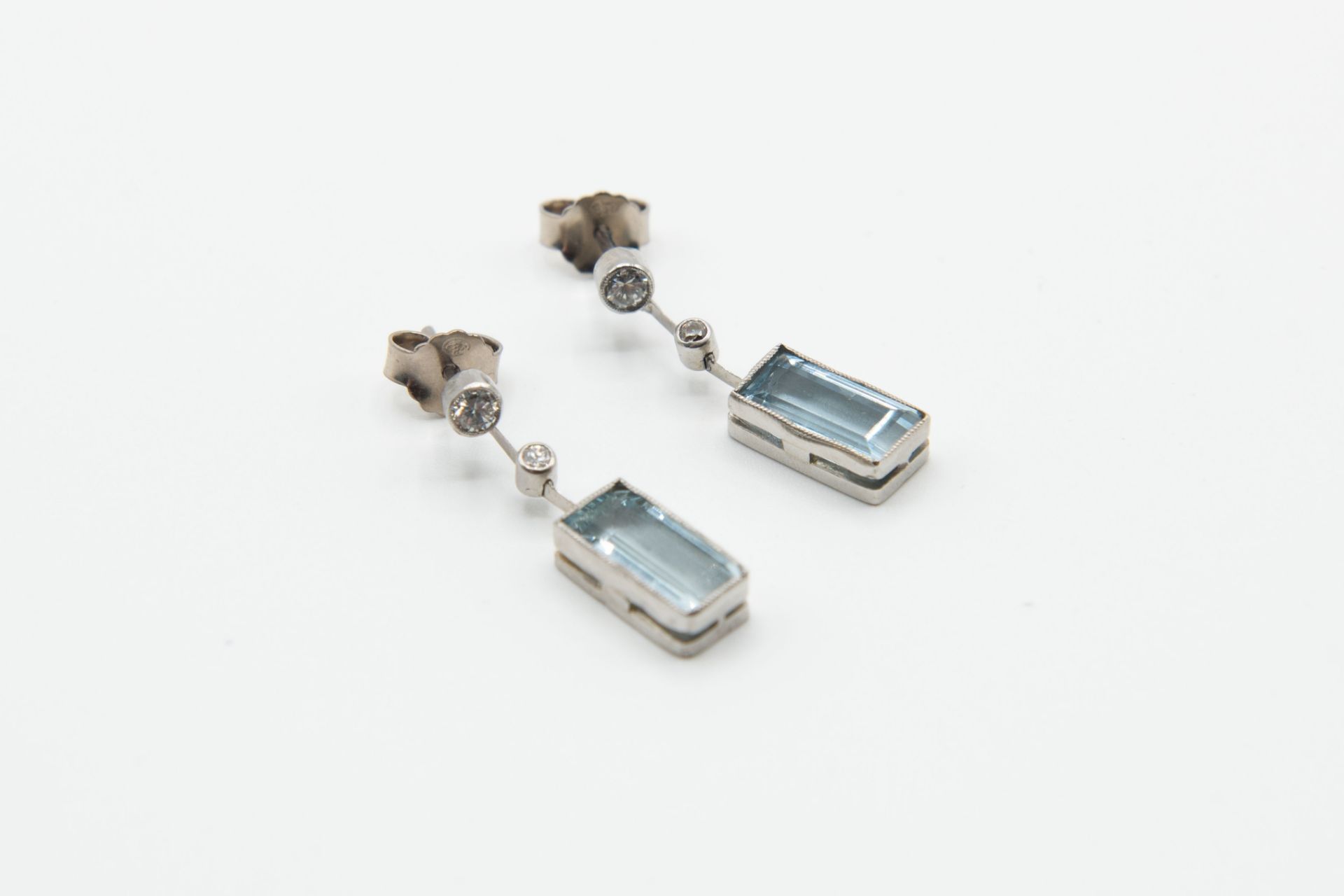 A PAIR OF AQUAMARINE AND DIAMOND EARRINGS