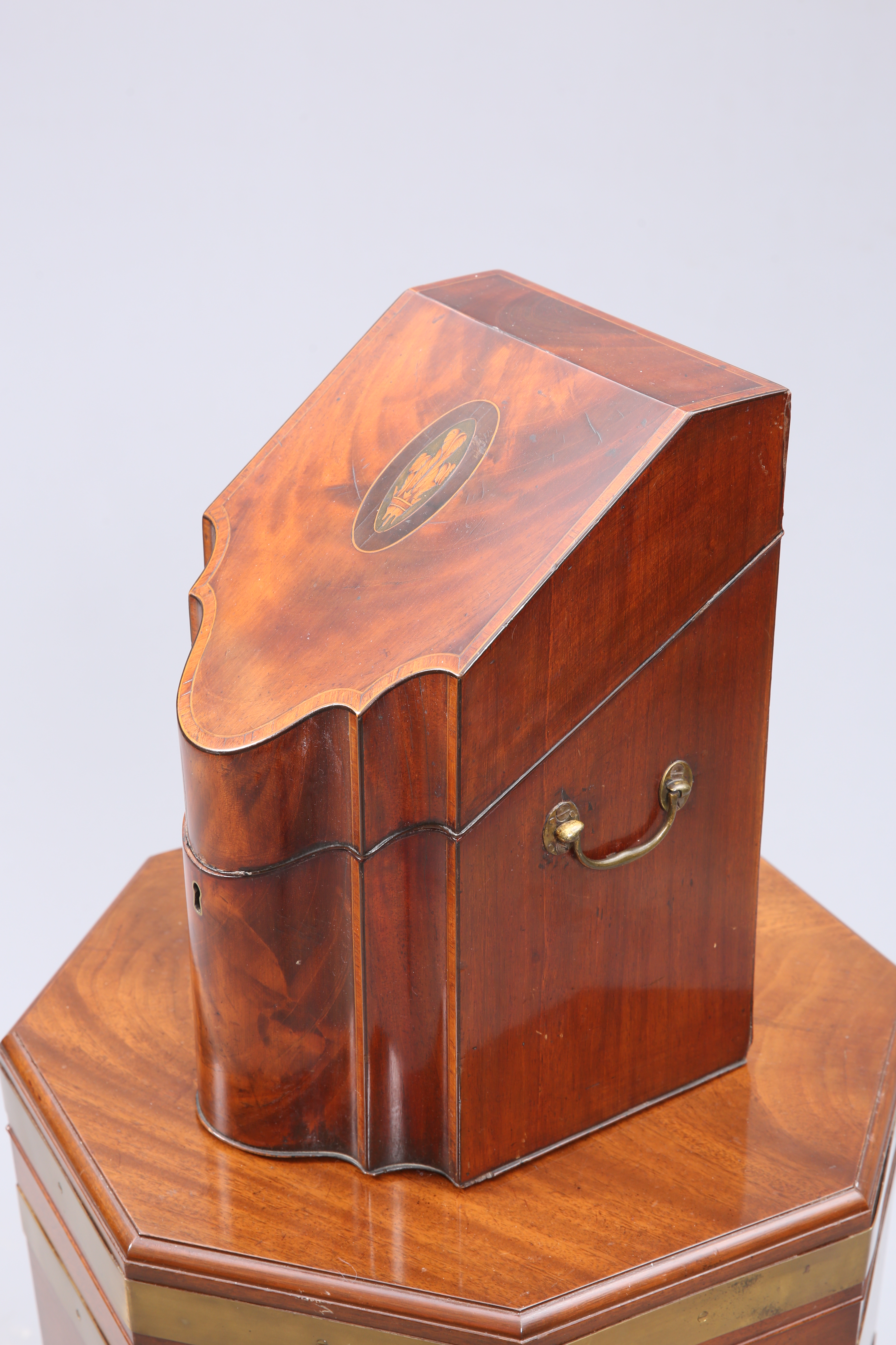 A GEORGE III FLAME MAHOGANY AND TULIPWOOD BANDED KNIFE BOX