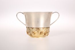 AN ELIZABETH II PARCEL-GILT SILVER ROYAL COMMEMORATIVE PORRINGER, BY STUART DEVLIN, LONDON, 1982