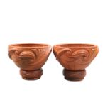 A PAIR OF HAND MADE TERRACOTTA "CELTIC" BULB BOWLS