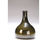 A DARK GREEN GLASS TRANSITIONAL ONION/MALLET BOTTLE, 18th/19th CENTURY