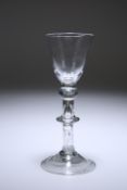 A SMALL BALUSTROID WINE GLASS, c. 1720