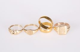 TWO 22 CARAT GOLD BANDS AND THREE 9 CARAT GOLD RINGS