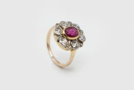 A NATURAL RUBY AND DIAMOND RING